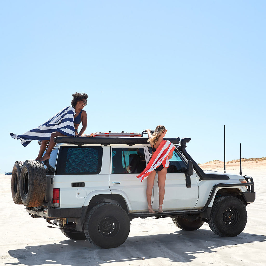 dock and bay towels beach