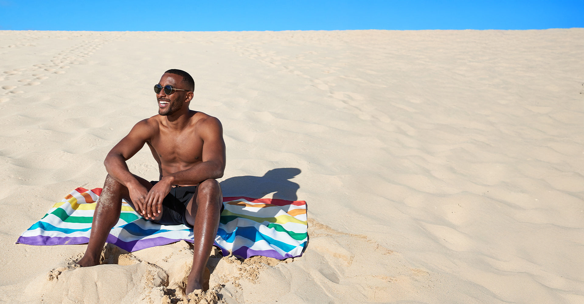 Serviette séchage rapide Dock & Bay - Nuages arc-en-ciel